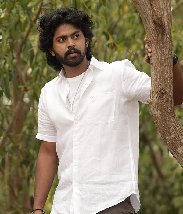 Man wearing a white European linen shirt